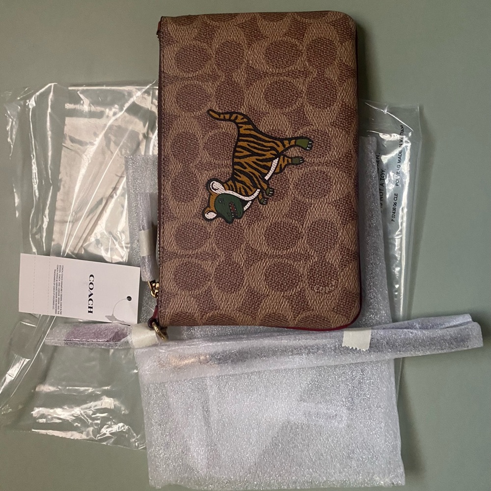 Lunar New Year Small Wristlet In Signature Canvas With Tiger Rexy